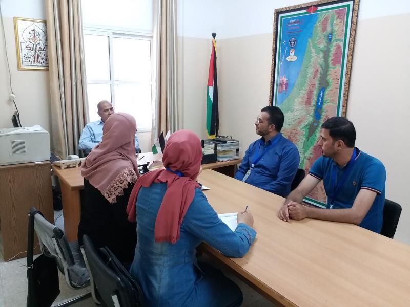 فريق الوطني للتعداد في محافظة دير البلح يتفقد قاعات التدريب في جامعة القدس المفتوحة